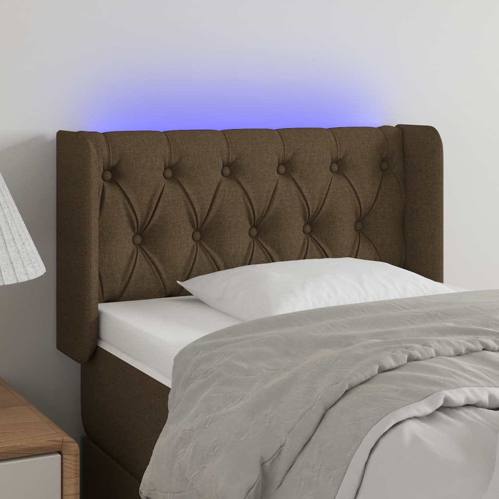 sengegavl med LED-lys 83x16x78/88 cm stof mørkebrun