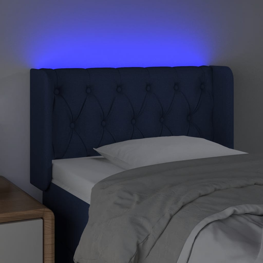 sengegavl med LED-lys 83x16x78/88 cm stof blå