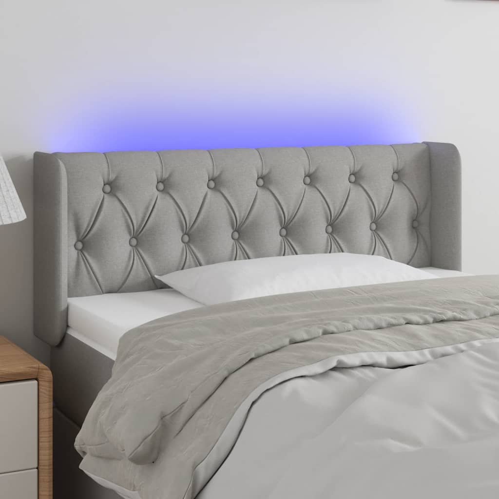 sengegavl med LED-lys 93x16x78/88 cm stof lysegrå