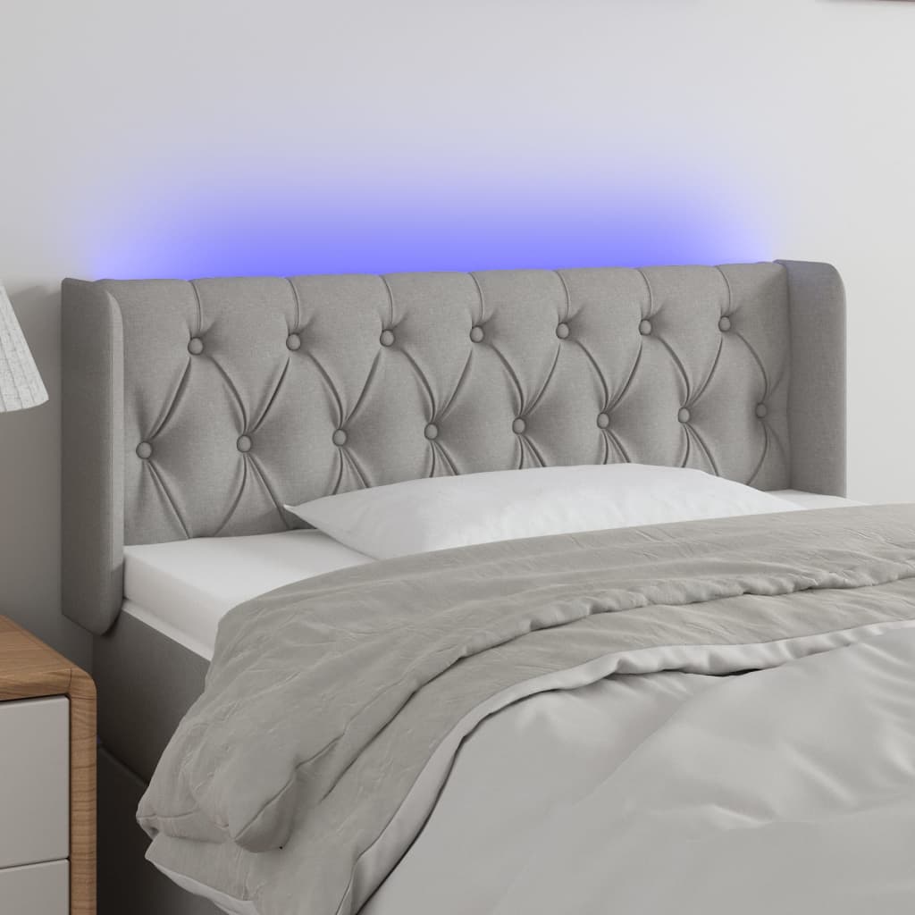 sengegavl med LED-lys 103x16x78/88 cm stof lysegrå