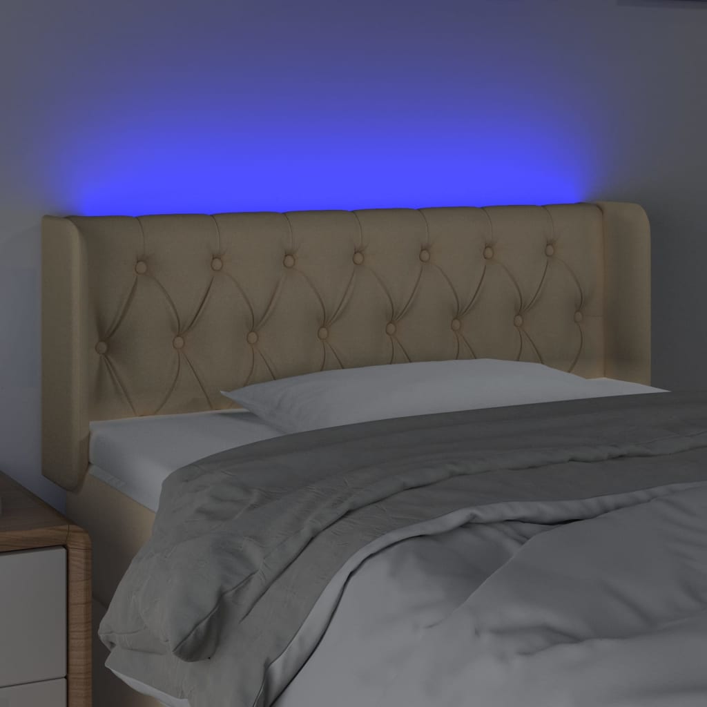 sengegavl med LED-lys 103x16x78/88 cm stof cremefarvet