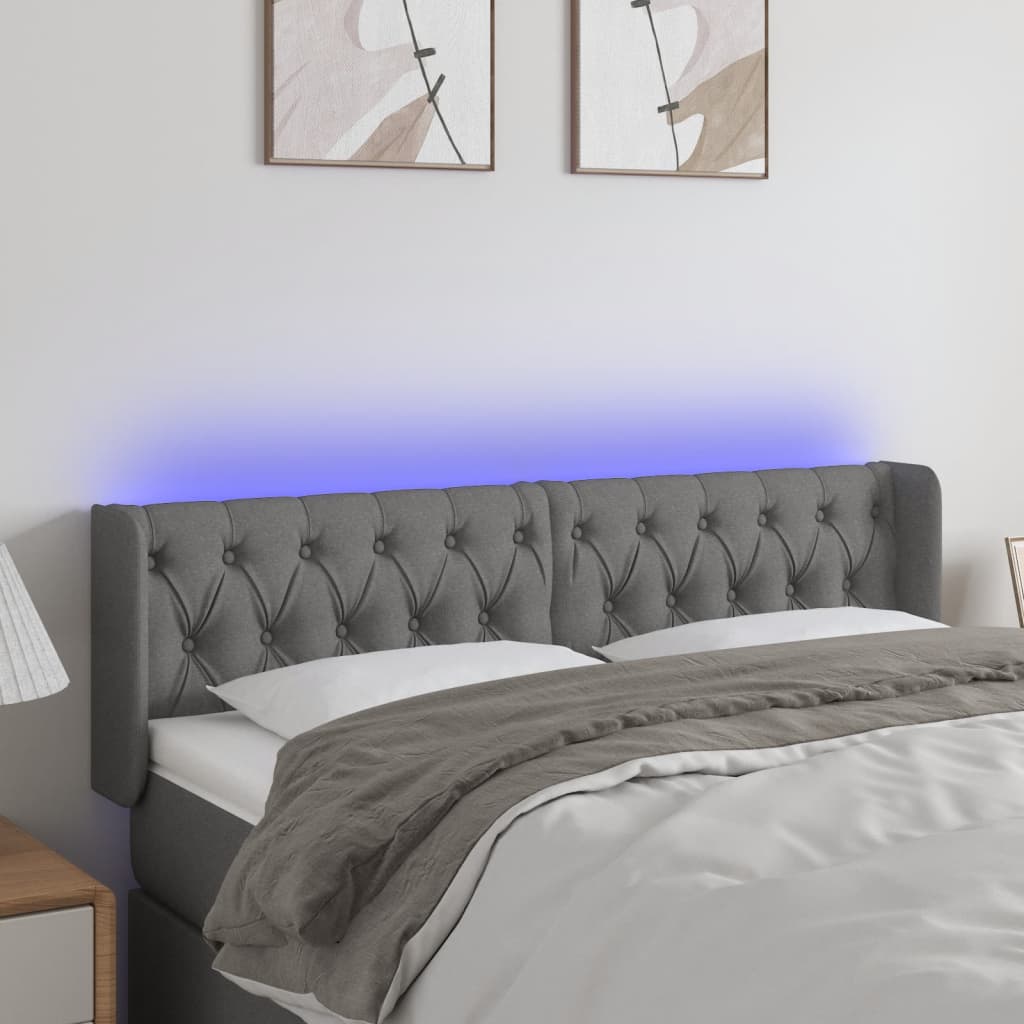 sengegavl med LED-lys 147x16x78/88 cm stof mørkegrå