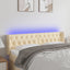 sengegavl med LED-lys 147x16x78/88 cm stof cremefarvet