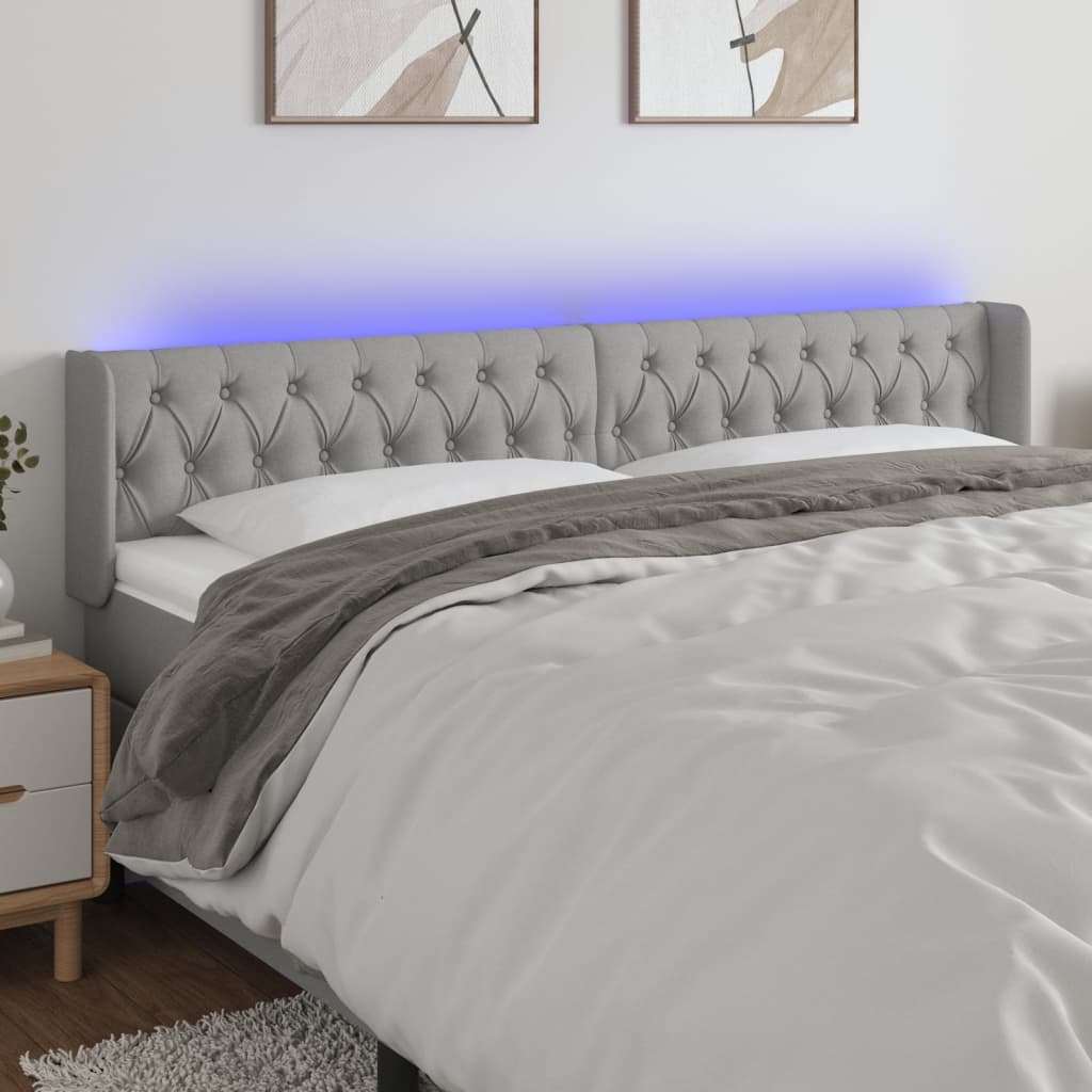 sengegavl med LED-lys 183x16x78/88 cm stof lysegrå