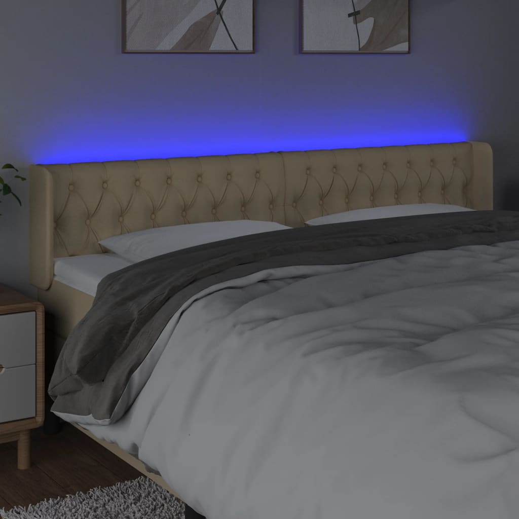 sengegavl med LED-lys 203x16x78/88 cm stof cremefarvet