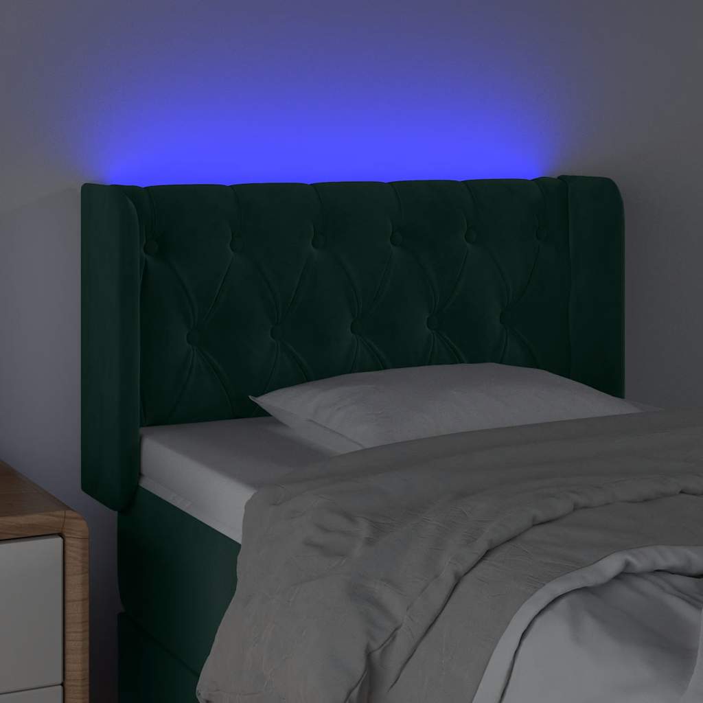 sengegavl med LED-lys 83x16x78/88 cm fløjl Mørkegrøn