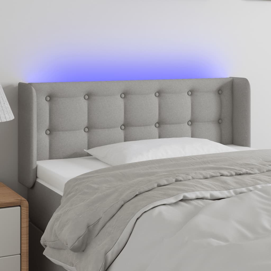 sengegavl med LED-lys 83x16x78/88 cm stof lysegrå