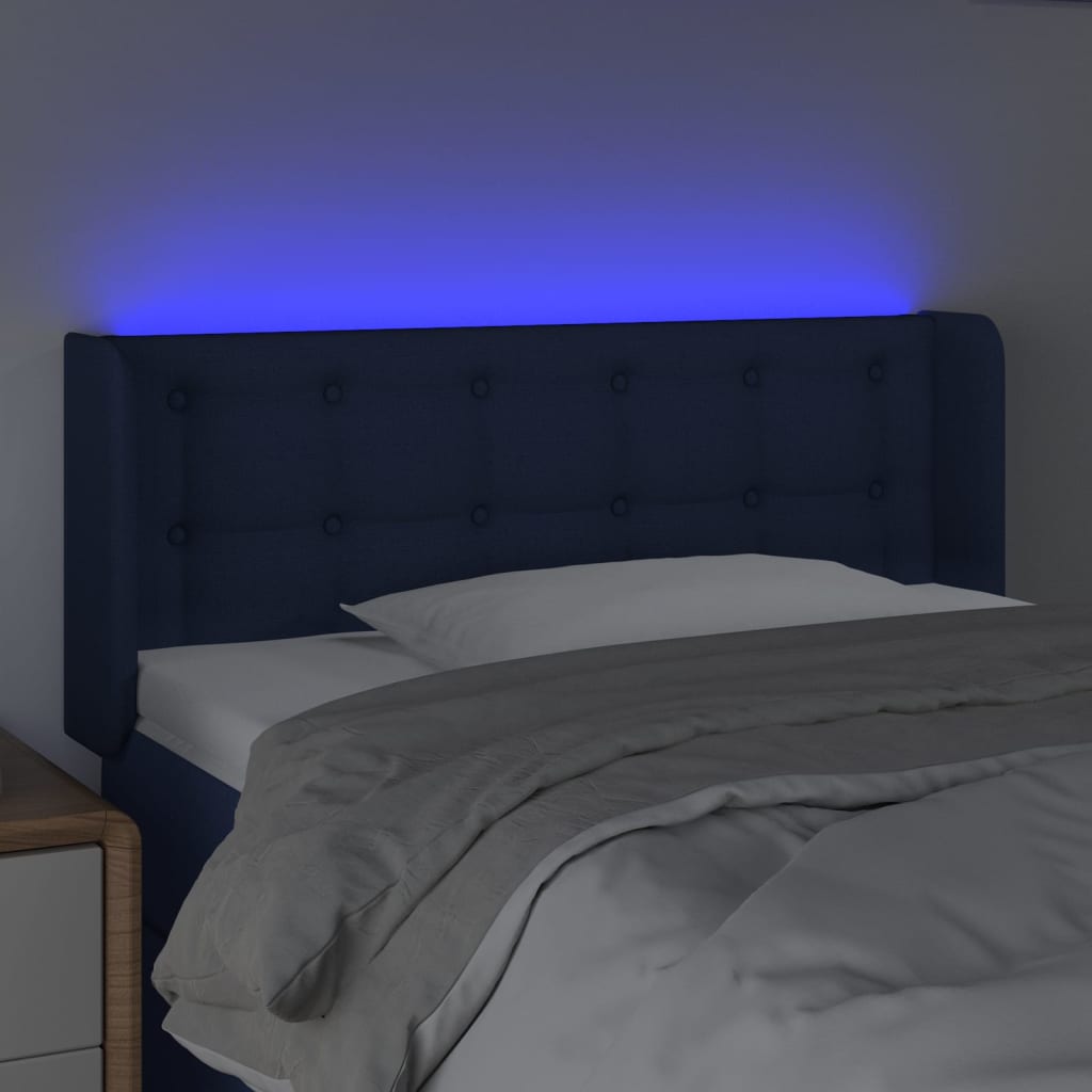 sengegavl med LED-lys 83x16x78/88 cm stof blå