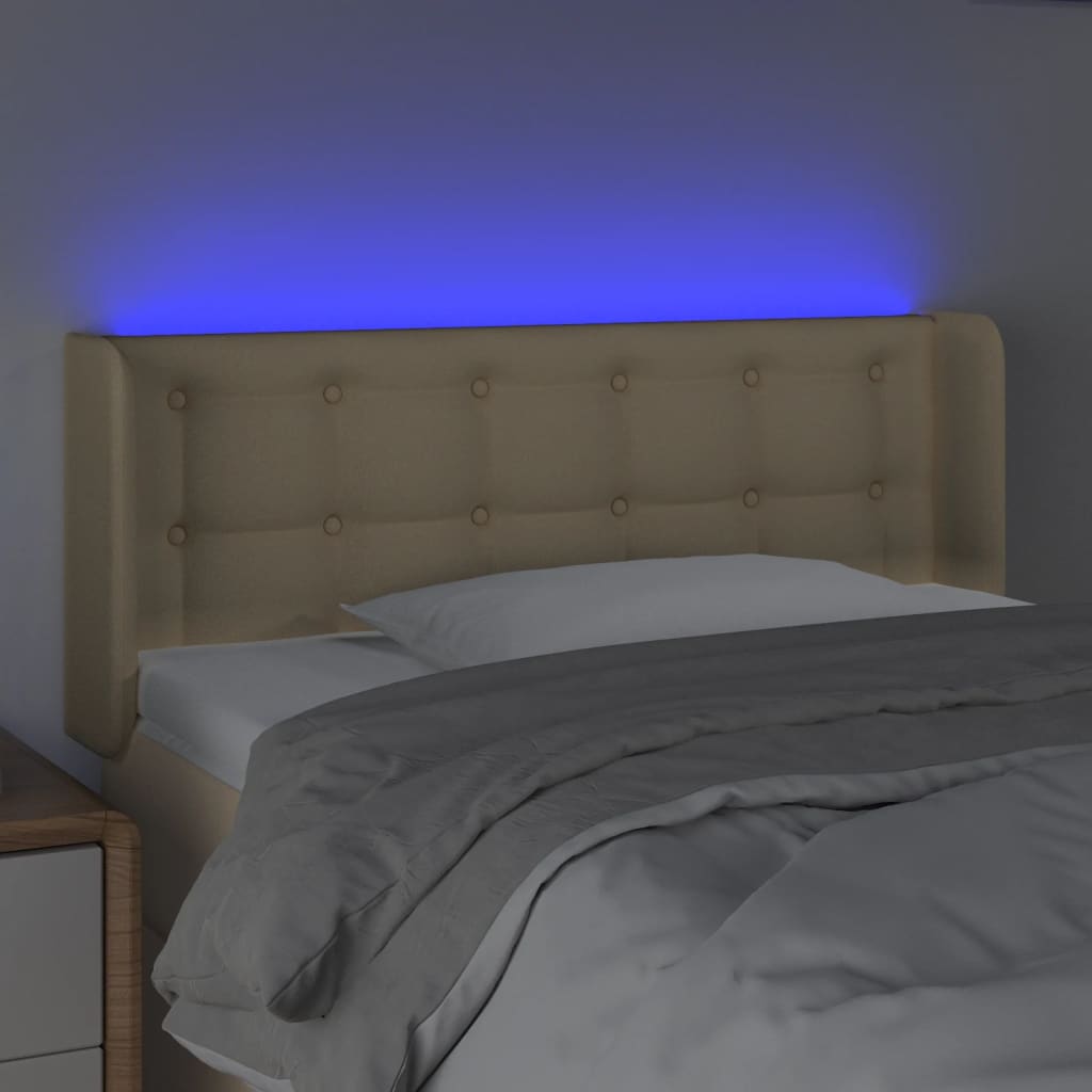 sengegavl med LED-lys 93x16x78/88 cm stof cremefarvet