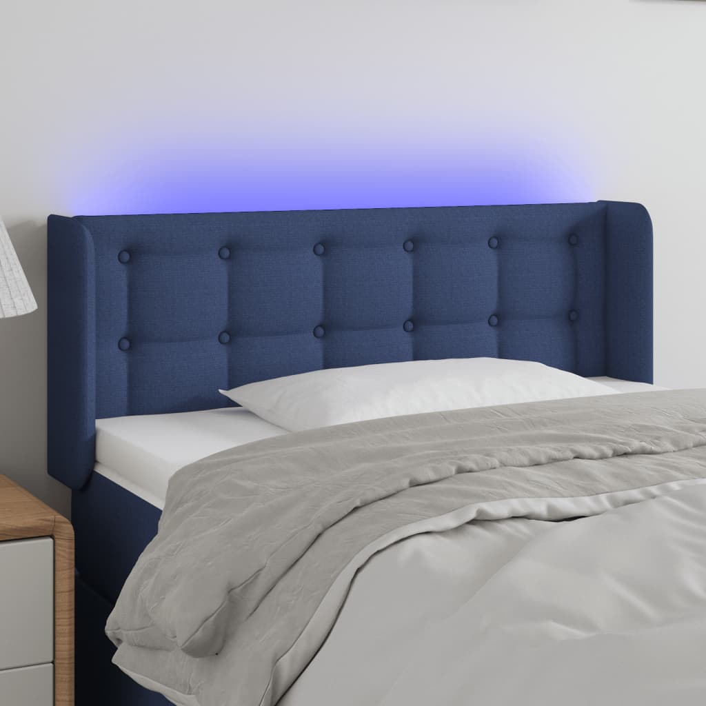 sengegavl med LED-lys 93x16x78/88 cm stof blå