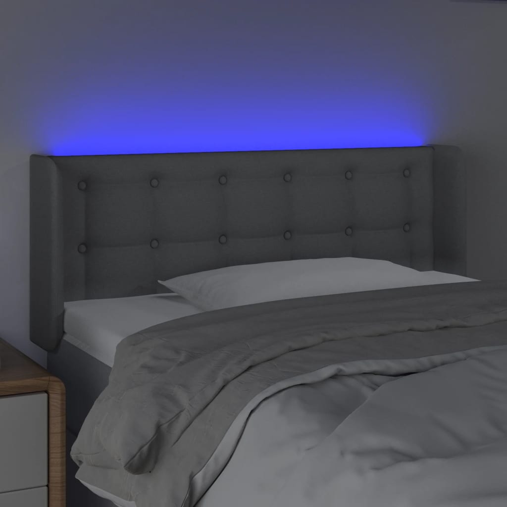 sengegavl med LED-lys 103x16x78/88 cm stof lysegrå