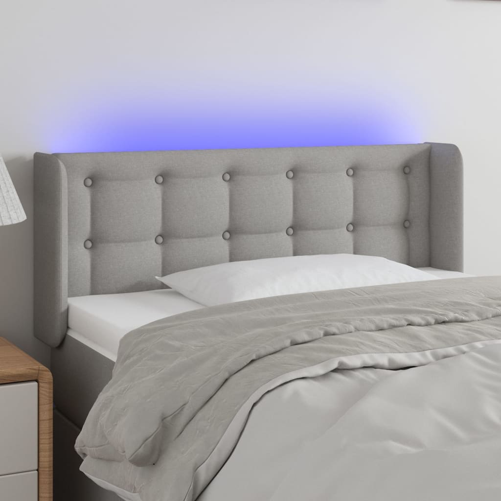 sengegavl med LED-lys 103x16x78/88 cm stof lysegrå