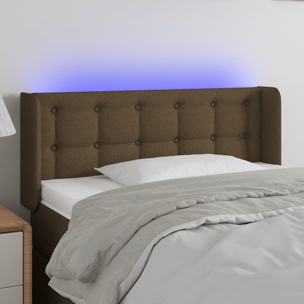 sengegavl med LED-lys 103x16x78/88 cm stof mørkebrun