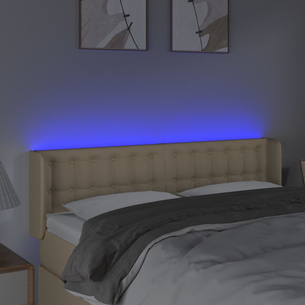 sengegavl med LED-lys 147x16x78/88 cm stof cremefarvet