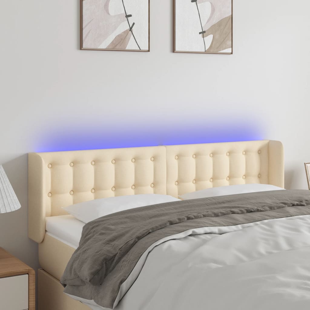 sengegavl med LED-lys 147x16x78/88 cm stof cremefarvet