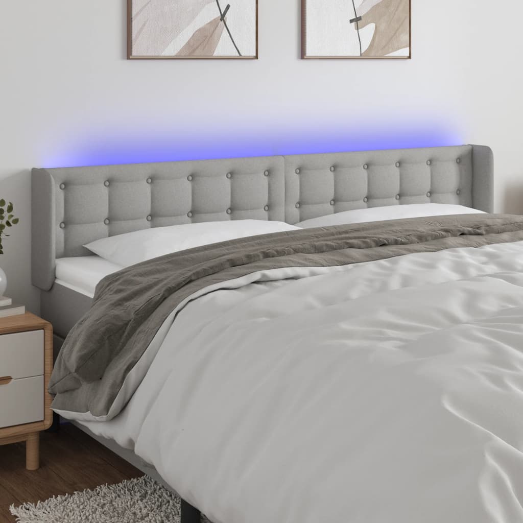 sengegavl med LED-lys 203x16x78/88 cm stof lysegrå
