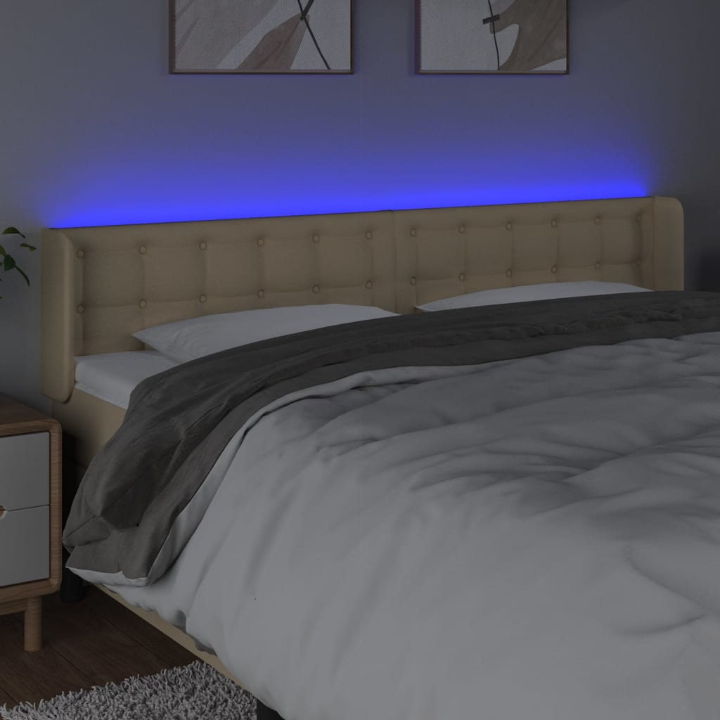 sengegavl med LED-lys 203x16x78/88 cm stof cremefarvet