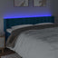 sengegavl med LED-lys 163x16x78/88 cm fløjl mørkeblå