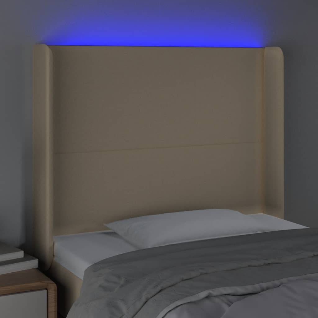 sengegavl med LED-lys 93x16x118/128 cm stof cremefarvet