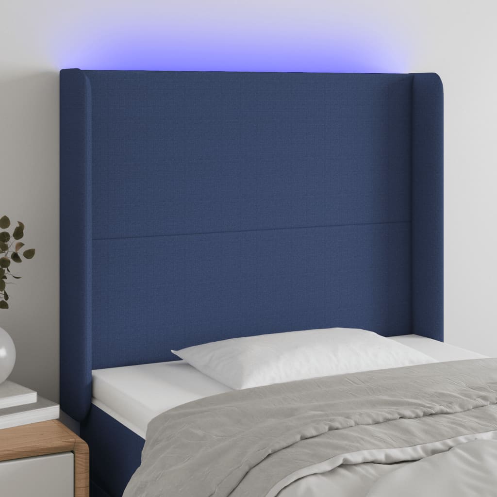 sengegavl med LED-lys 93x16x118/128 cm stof blå