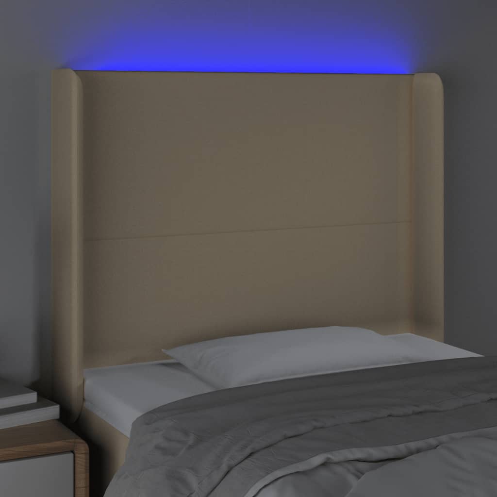 sengegavl med LED-lys 103x16x118/128 cm stof cremefarvet