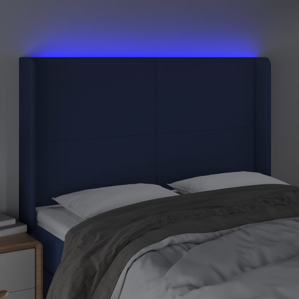 sengegavl med LED-lys 147x16x118/128 cm stof blå