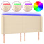 sengegavl med LED-lys 183x16x118/128 cm stof cremefarvet