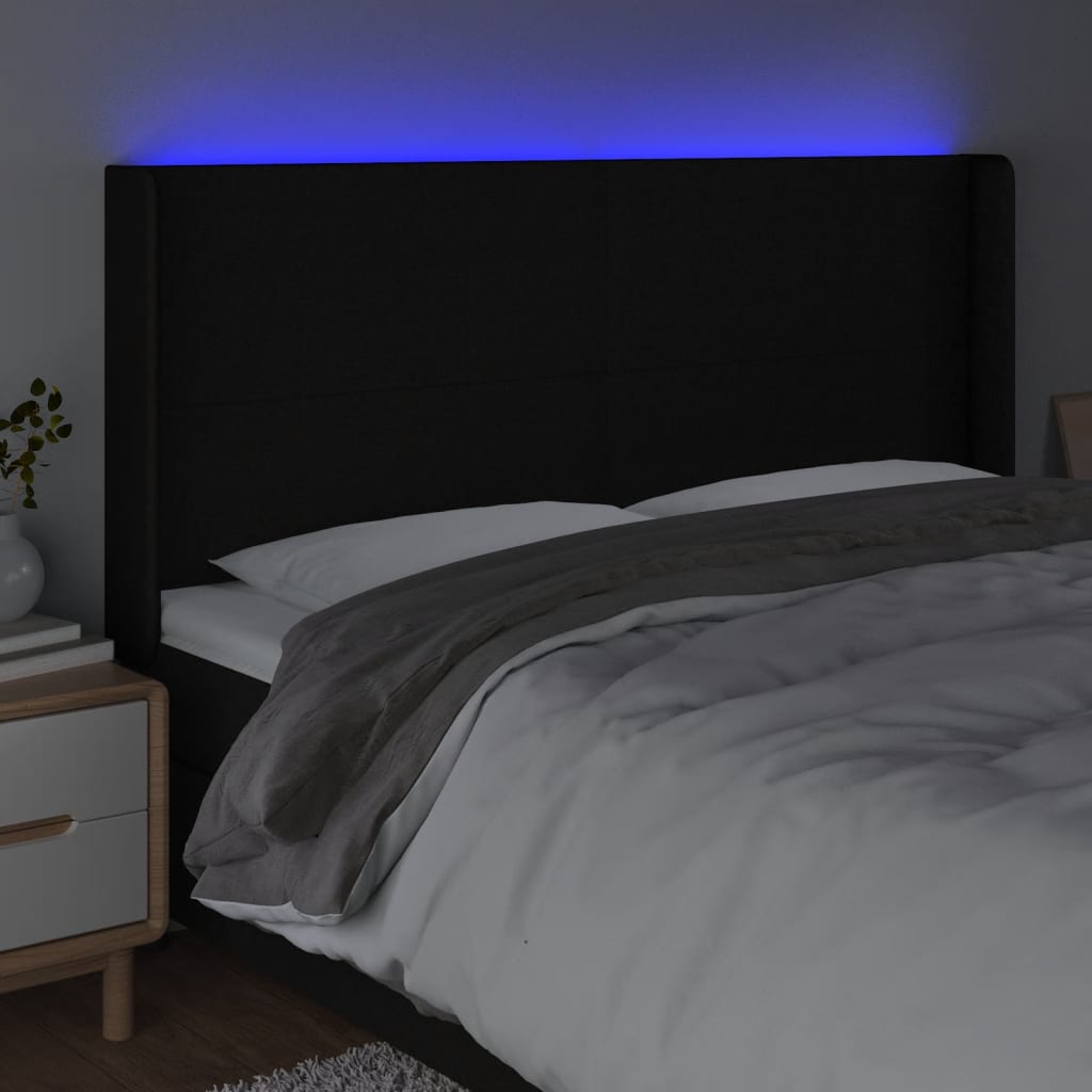 sengegavl med LED-lys 203x16x118/128 cm stof sort