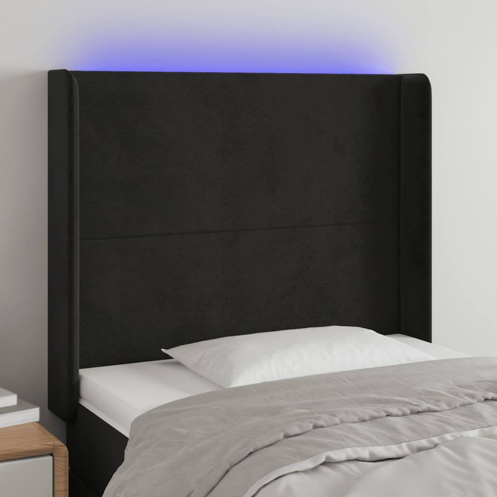sengegavl med LED-lys 83x16x118/128 cm fløjl sort