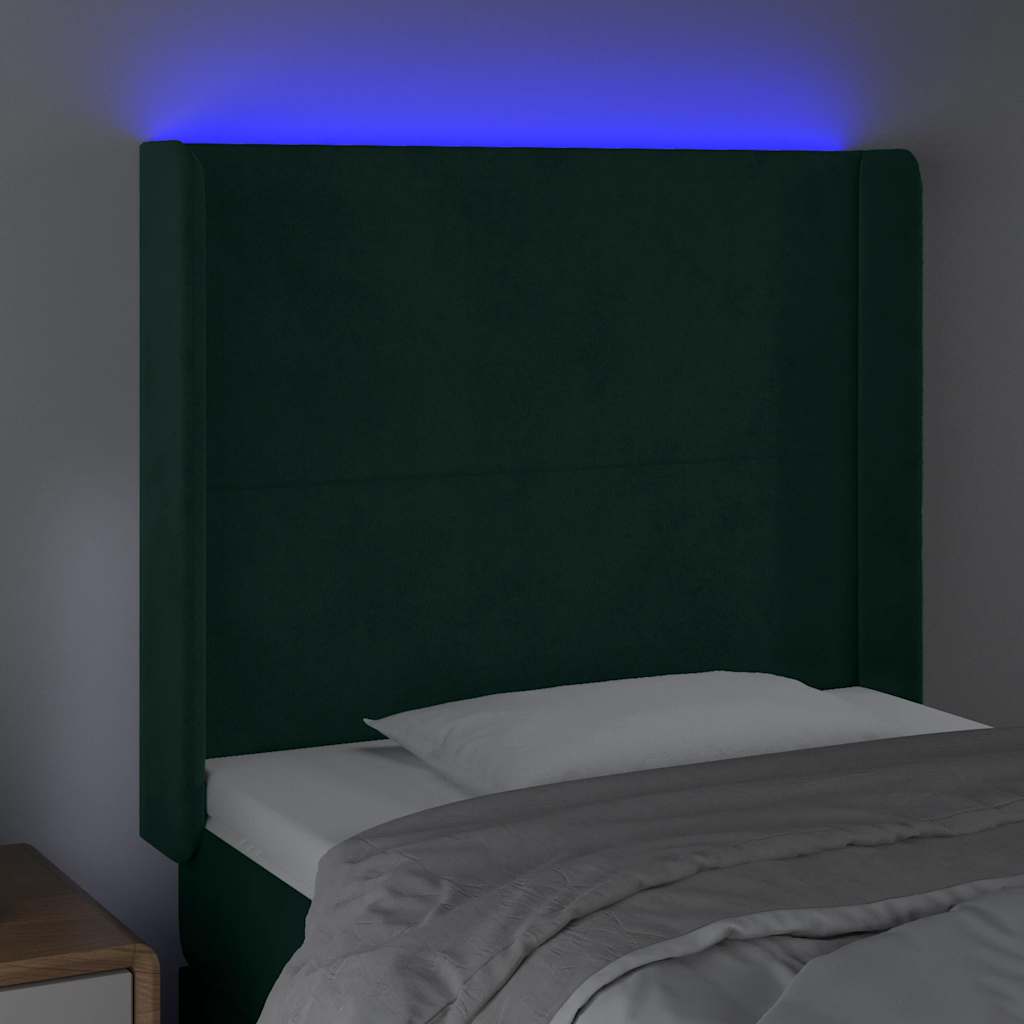 sengegavl med LED-lys 83x16x118/128 cm fløjl mørkegrøn