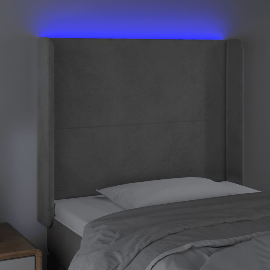 sengegavl med LED-lys 103x16x118/128 cm fløjl lysegrå