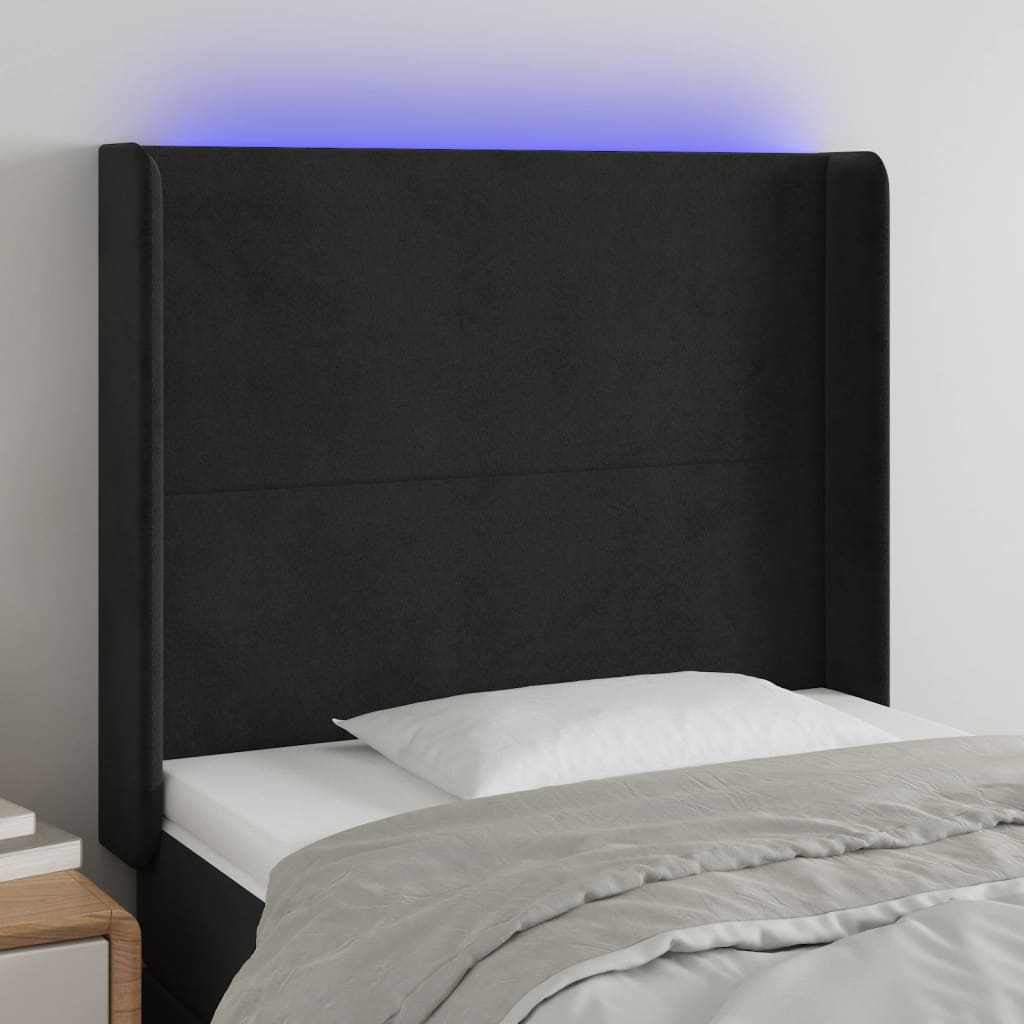 sengegavl med LED-lys 103x16x118/128 cm fløjl sort