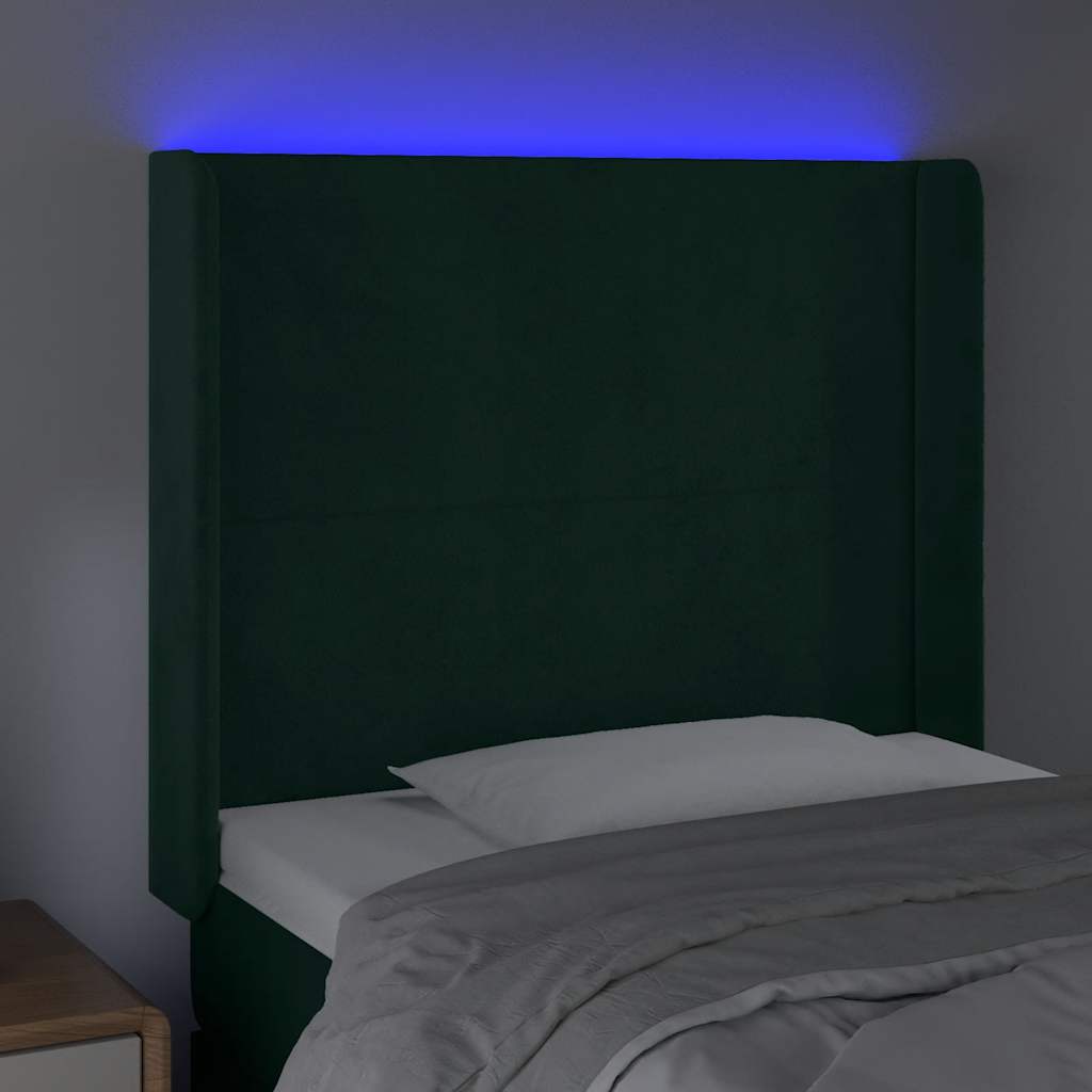 sengegavl med LED-lys 103x16x118/128 cm fløjl mørkegrøn