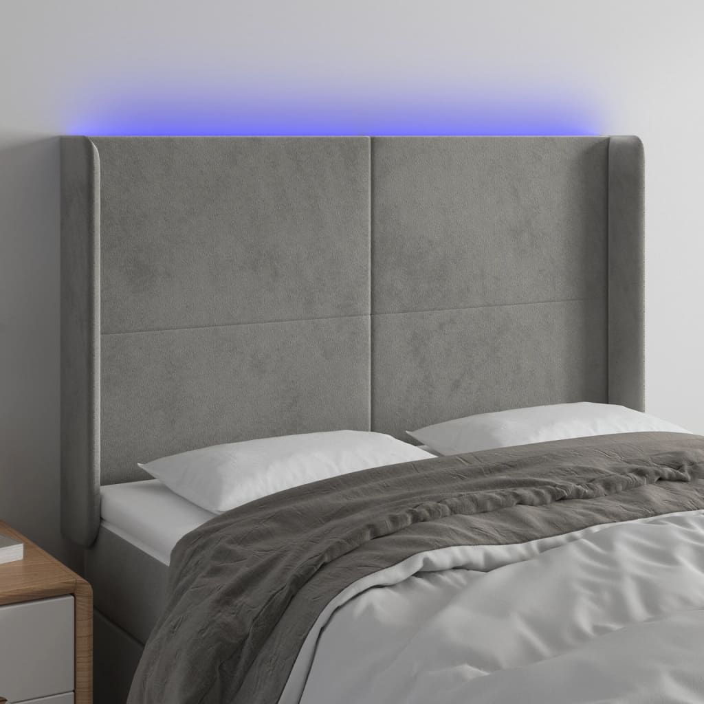 sengegavl med LED-lys 147x16x118/128 cm fløjl lysegrå