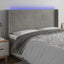 sengegavl med LED-lys 163x16x118/128 cm fløjl lysegrå