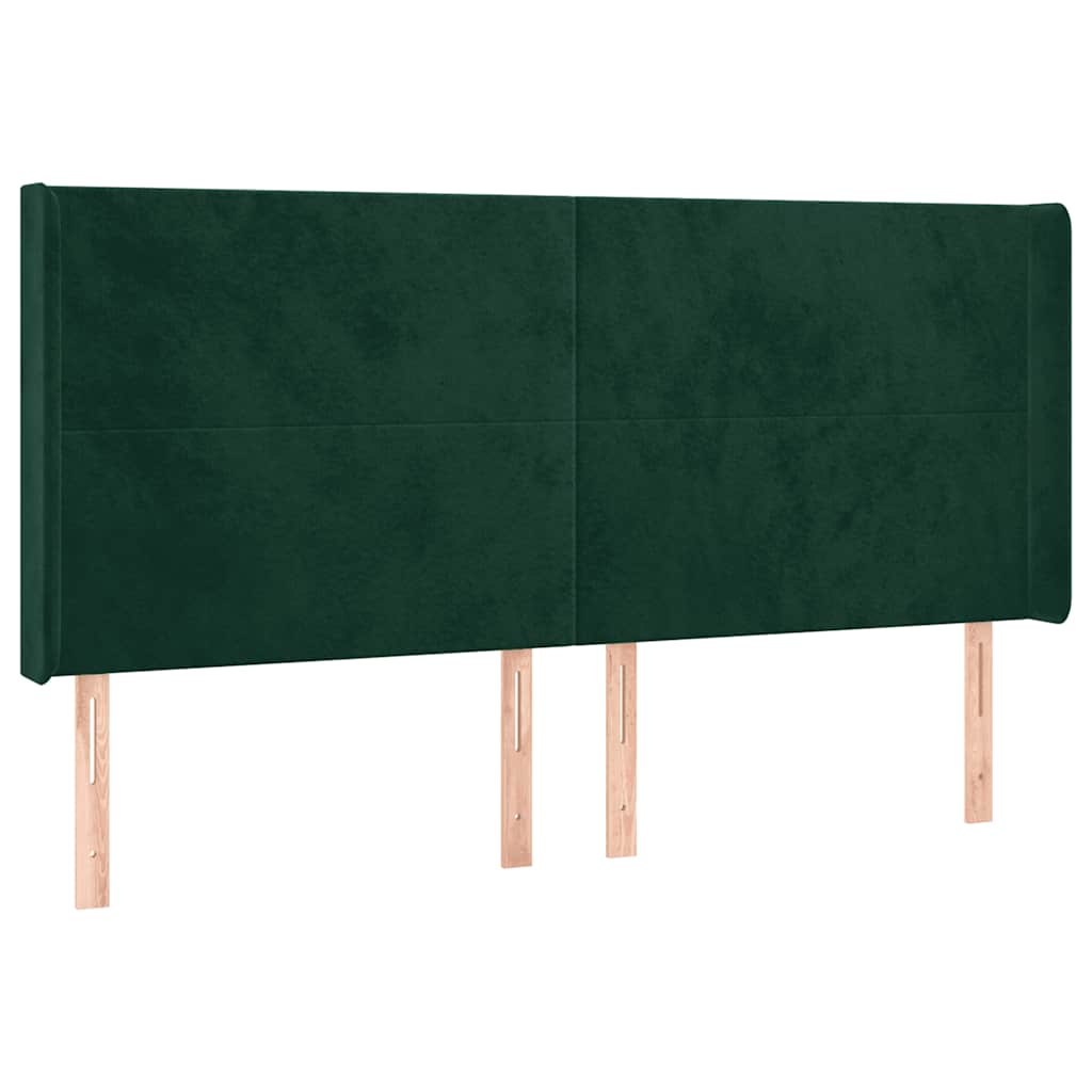 sengegavl med LED-lys 163x16x118/128 cm fløjl mørkegrøn