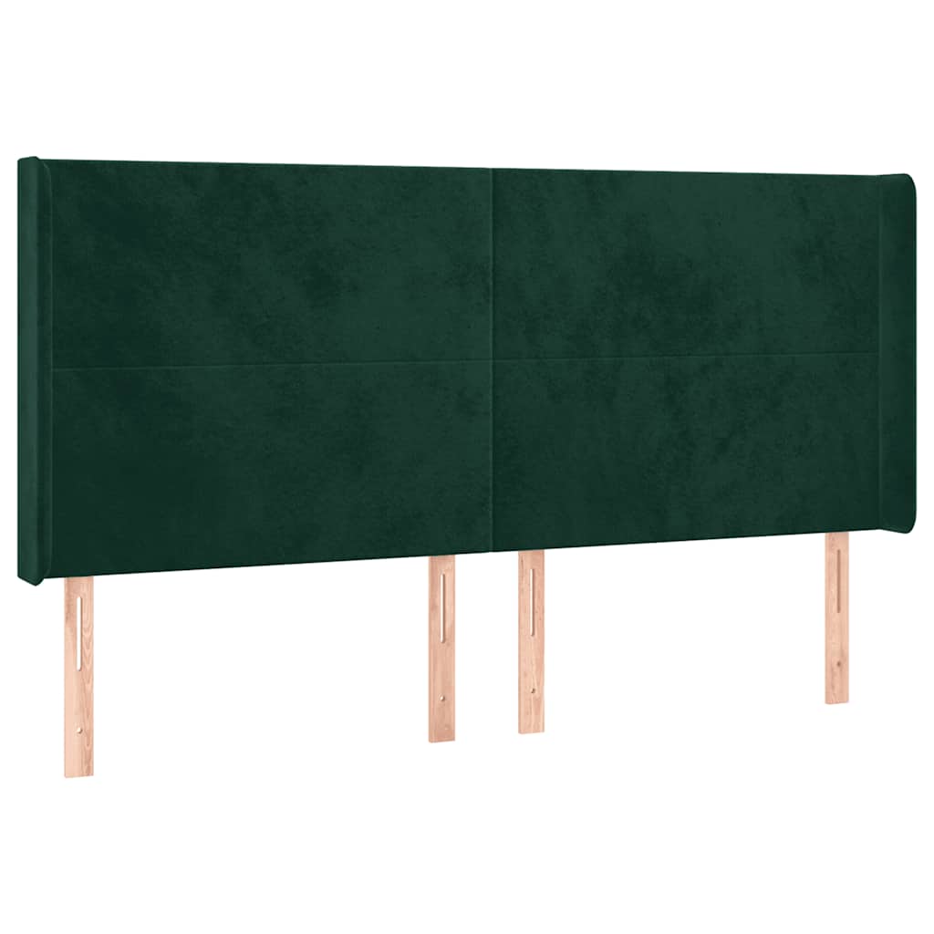 sengegavl med LED-lys 203x16x118/128 cm fløjl mørkegrøn