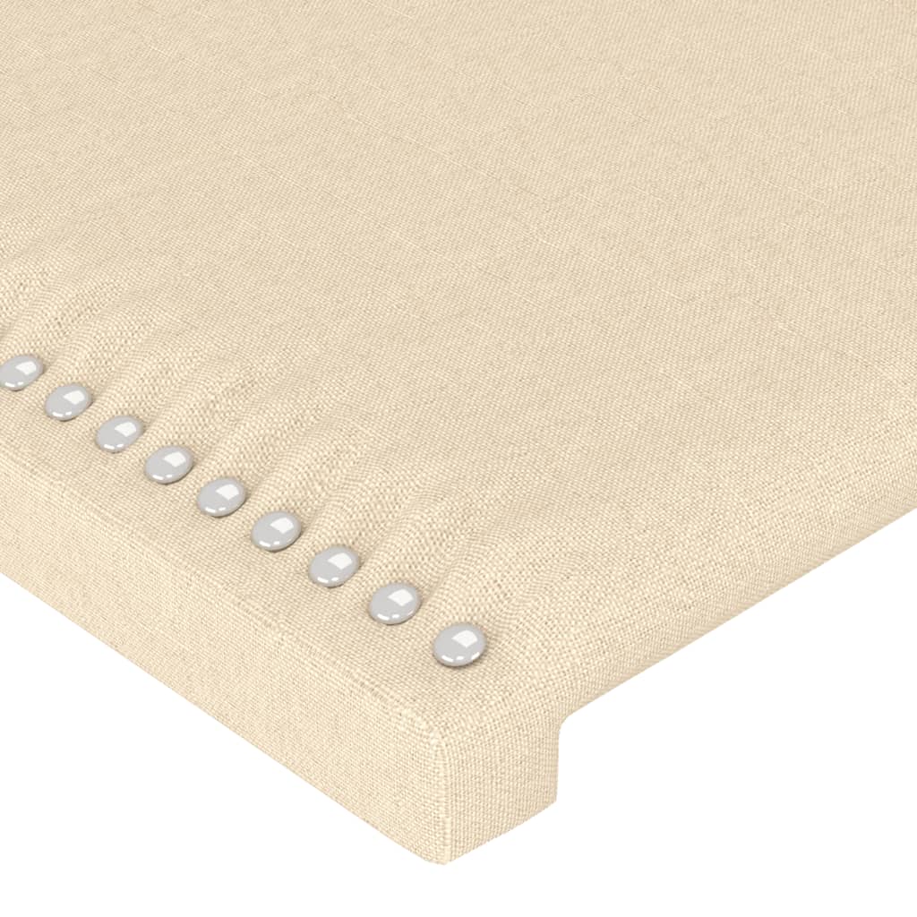 sengegavl med LED-lys 93x16x118/128 cm stof cremefarvet