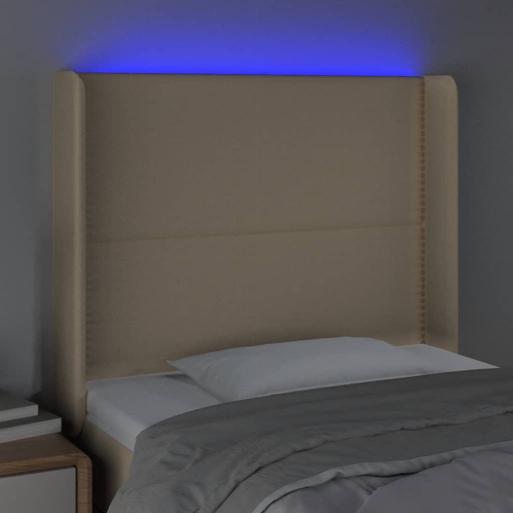 sengegavl med LED-lys 103x16x118/128 cm stof cremefarvet
