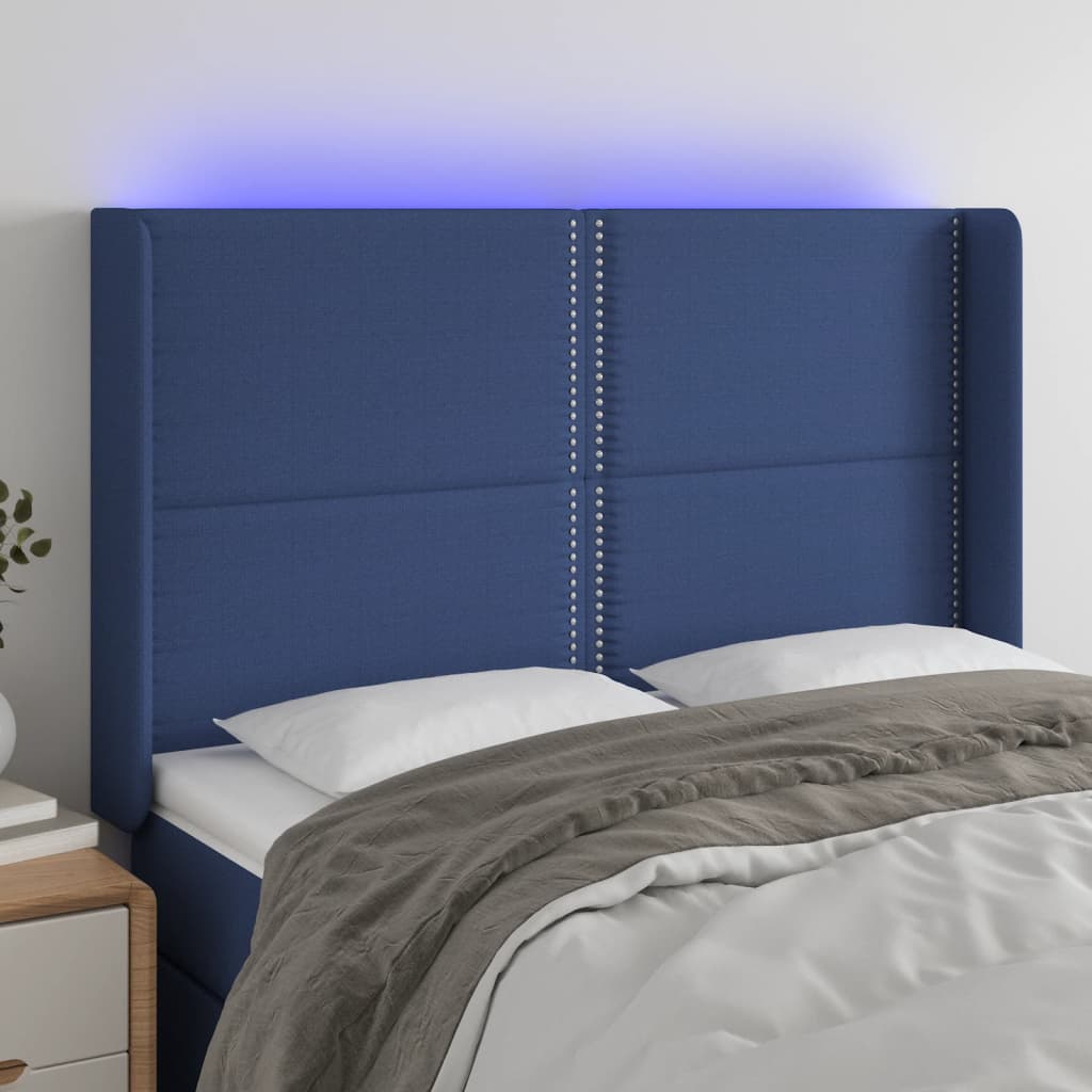 sengegavl med LED-lys 147x16x118/128 cm stof blå