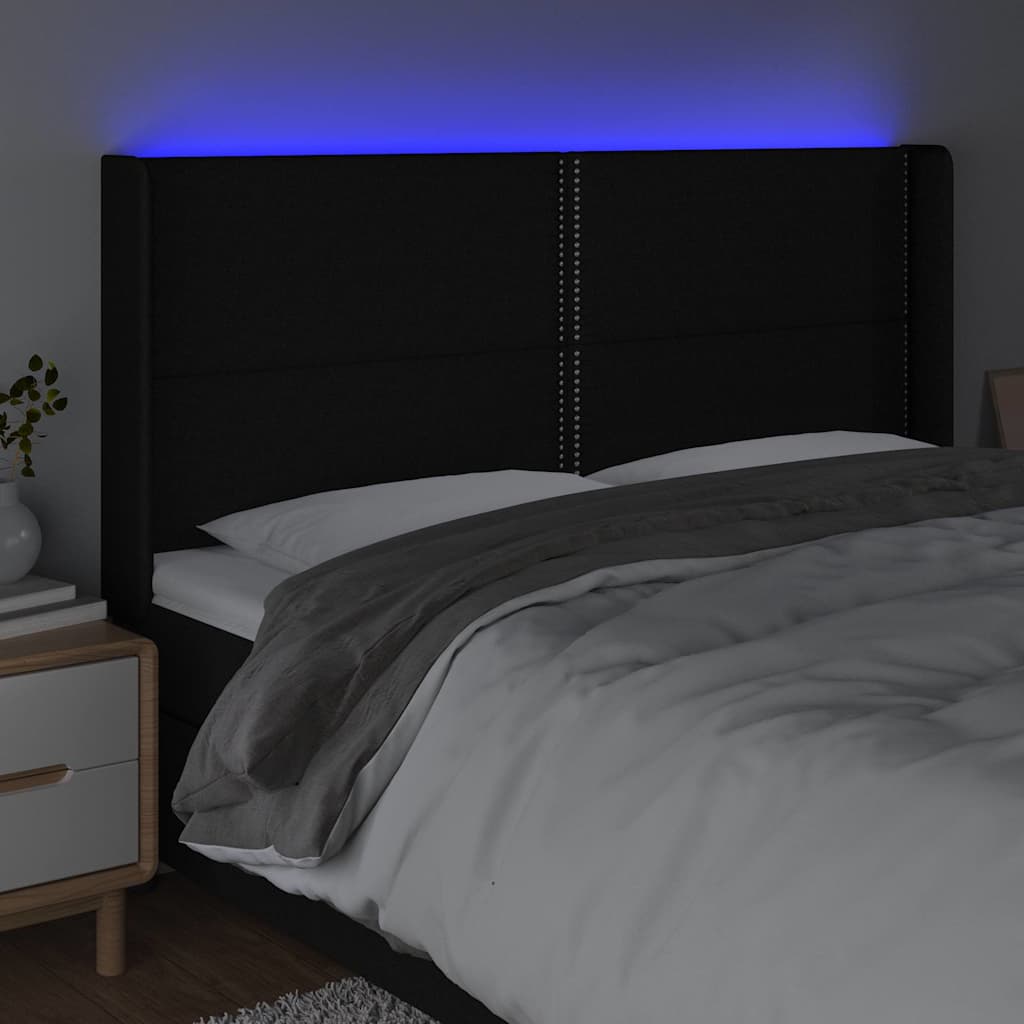 sengegavl med LED-lys 163x16x118/128 cm stof sort