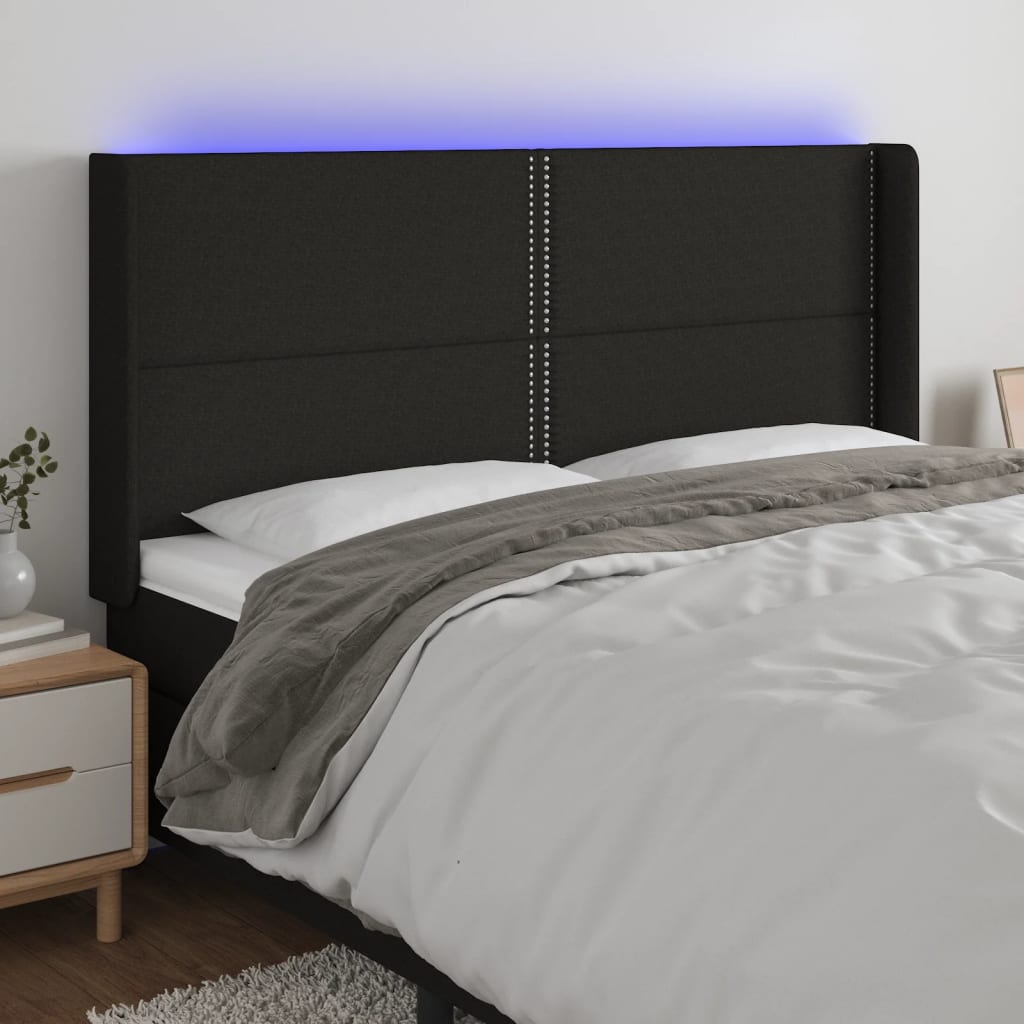 sengegavl med LED-lys 183x16x118/128 cm stof sort