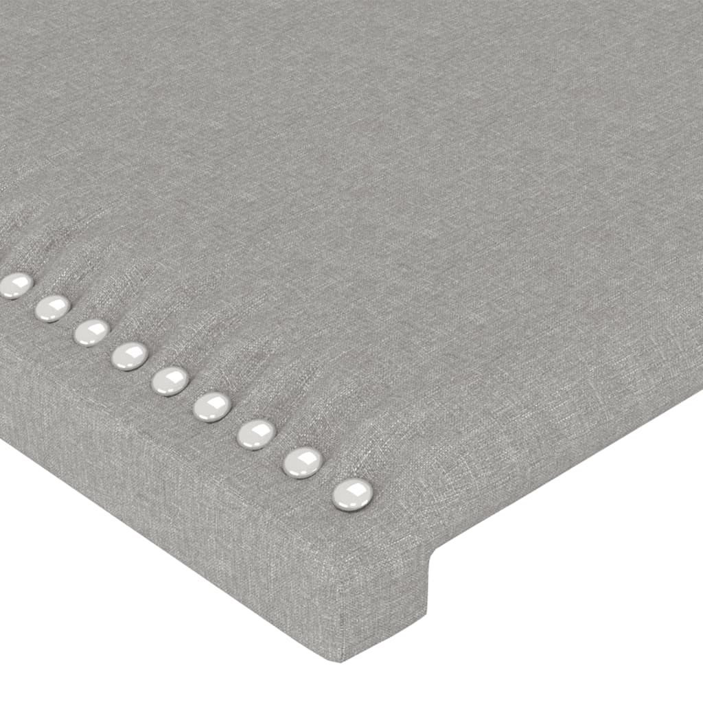 sengegavl med LED-lys 203x16x118/128 cm stof lysegrå