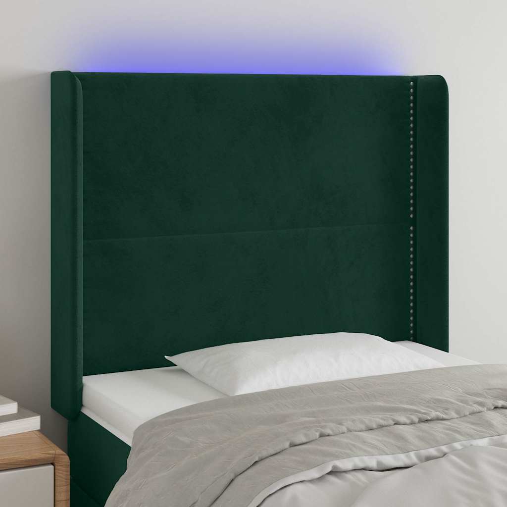 sengegavl med LED-lys 103x16x118/128 cm fløjl mørkegrøn