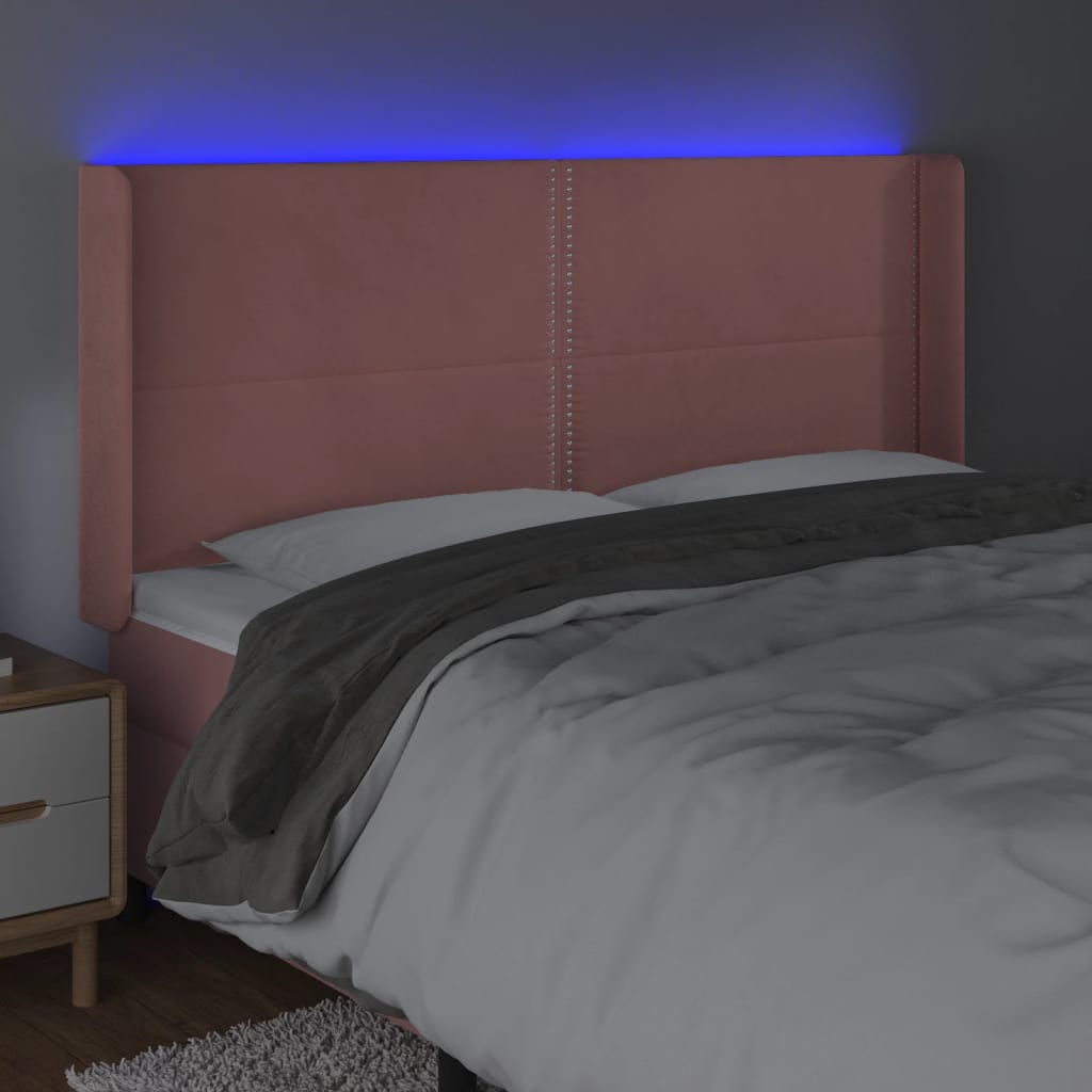 sengegavl med LED-lys 163x16x118/128 cm fløjl lyserød