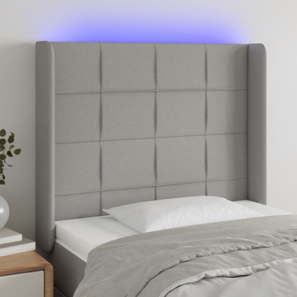 sengegavl med LED-lys 93x16x118/128 cm stof lysegrå