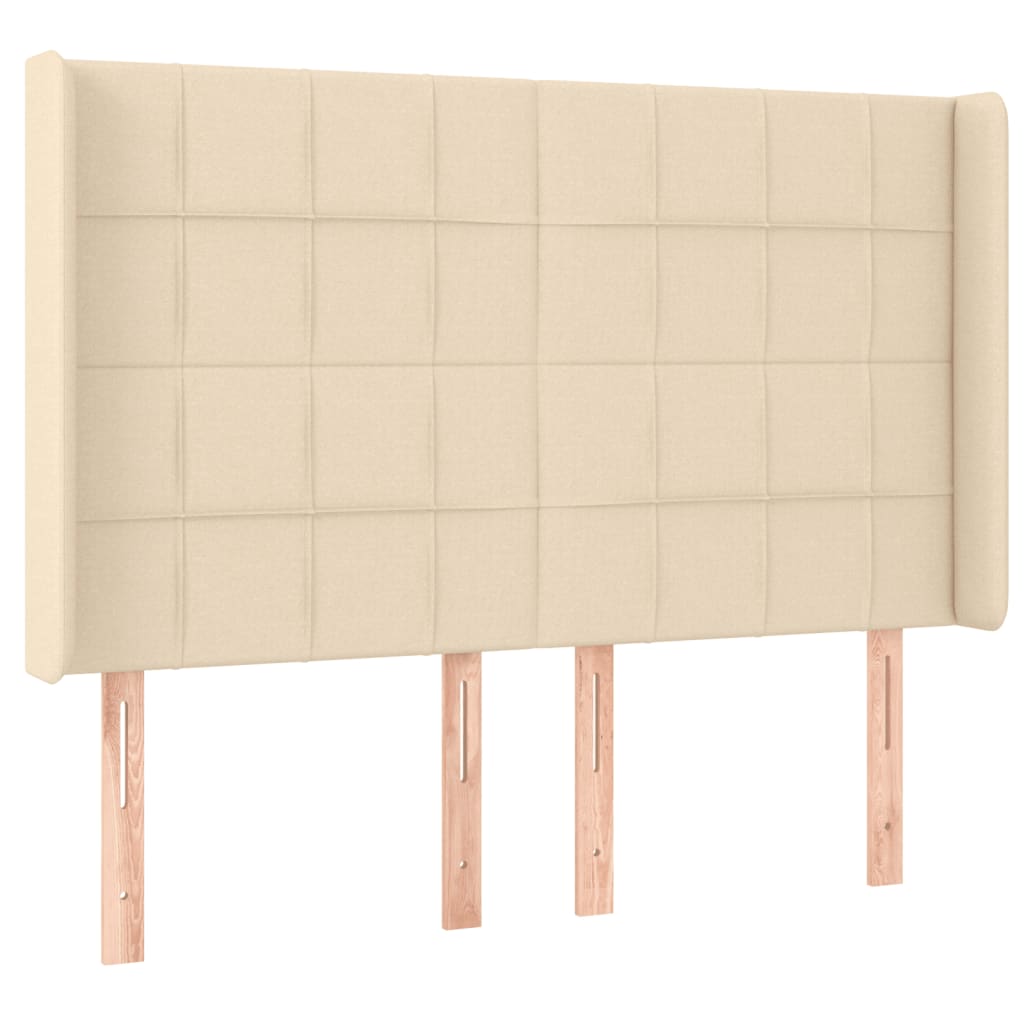 sengegavl med LED-lys 147x16x118/128 cm stof cremefarvet