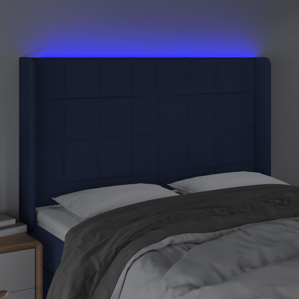 sengegavl med LED-lys 147x16x118/128 cm stof blå
