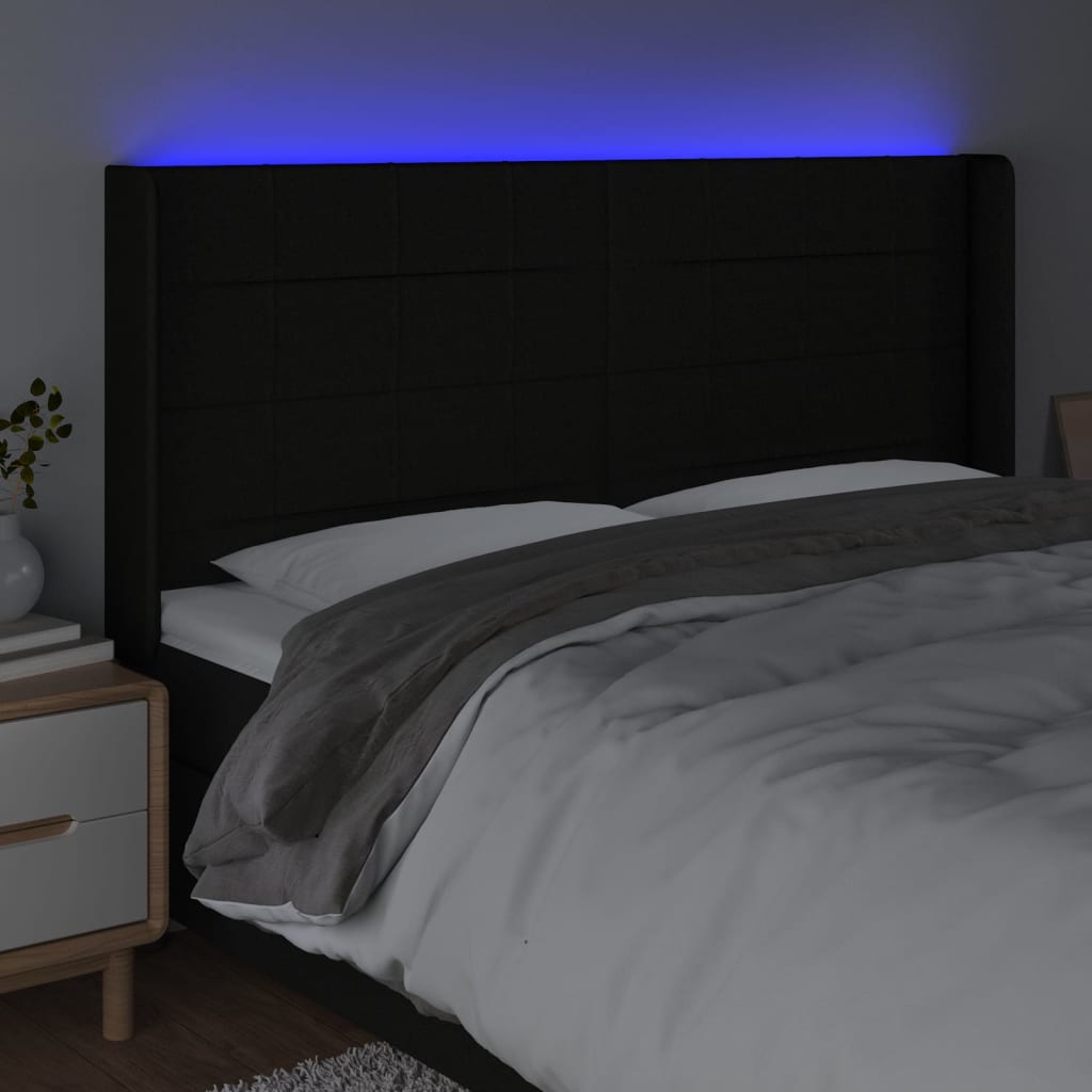 sengegavl med LED-lys 163x16x118/128 cm stof sort