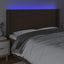 sengegavl med LED-lys 163x16x118/128 cm stof mørkebrun
